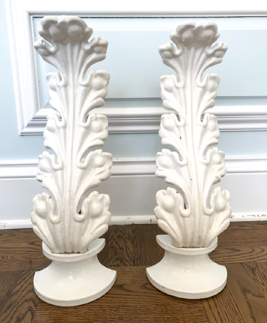 FRENCH ENAMELED IRON FIREPLACE ANDIRONS: Dimensions: H 19" x W 6.25" x D 9" Condition: Few stray paint marks.