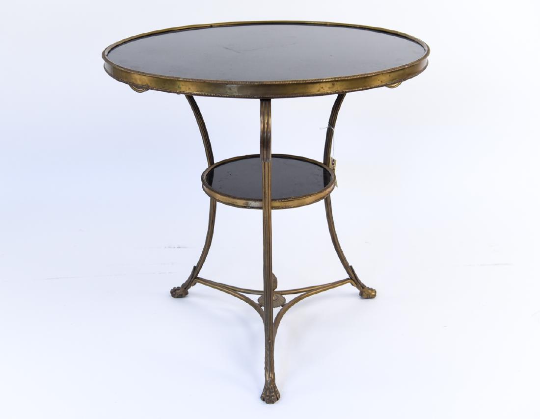 DIRECTOIRE FRENCH BRONZE GUERIDON TABLE: Dimensions: H 27.75" x Dia. 29" Condition: Some light tarnish. Lower tier needs realignment.