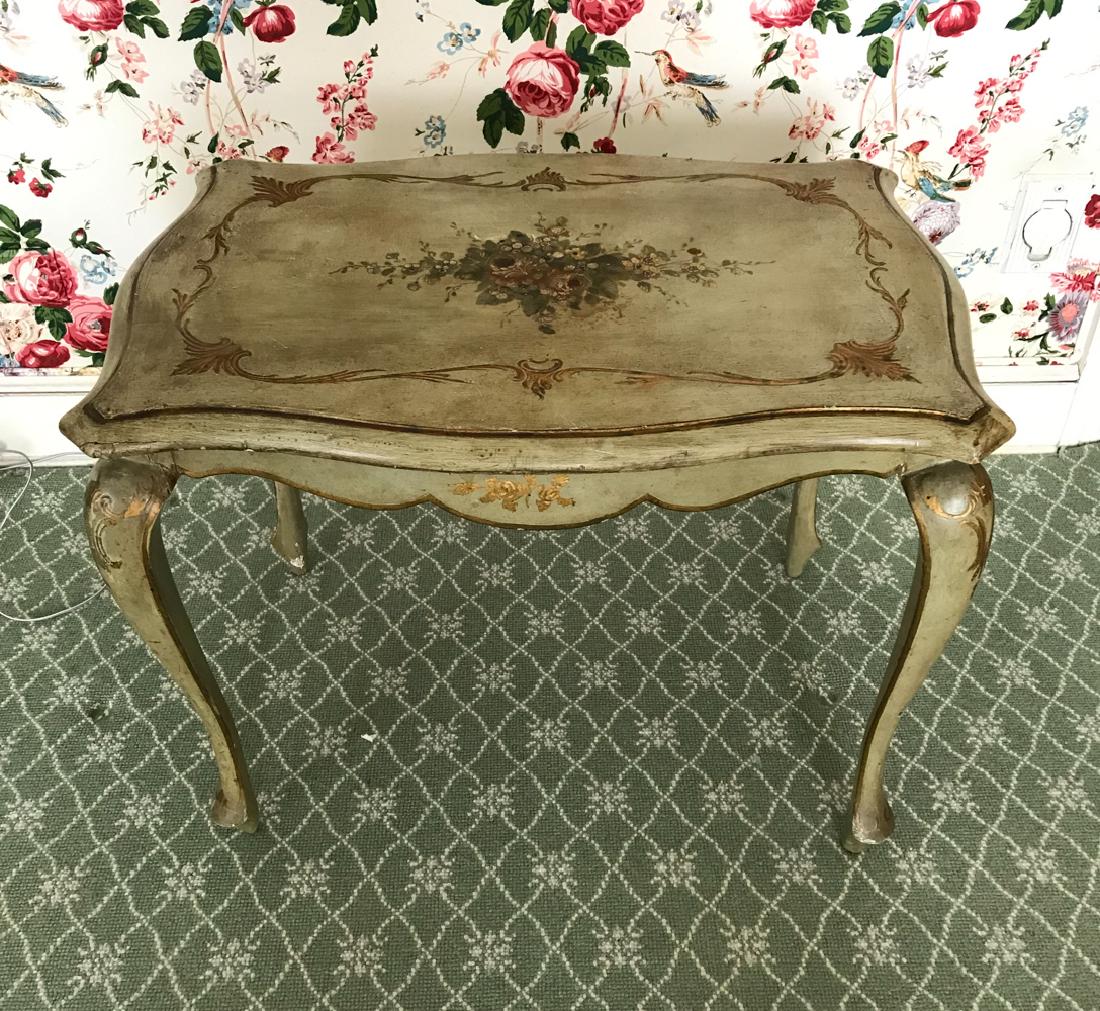 PAINT DECORATED SIDE TABLE: Dimensions: H 19.75" x W 25" x D 18" Condition: Repairs to legs. Wear to gilt and paint finish.