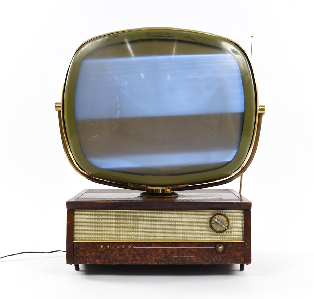 PHILCO PREDICTA VINTAGE TELEVISION TV: Dimensions: H 28" x W 23.5" x D 14.25" Condition: Some discoloration to TV body. Losses and surface wear to veneer on base. Pitting to metal. Some cracks to screen. Not tested. Vintage wear throughout