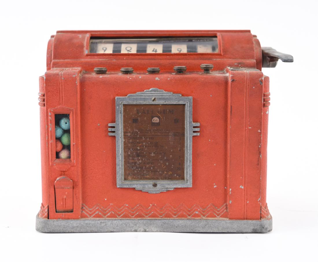 BALL GUM TRADE STIMULATOR: Vintage, c. 1920s/30s. In slot machine form. Paper name plate illegible. Rock-Ola product, marked inside. Dimensions: H 11" x W 13" x D 9" Condition: Unrestored. Untested. Surface wear. Back plate wit