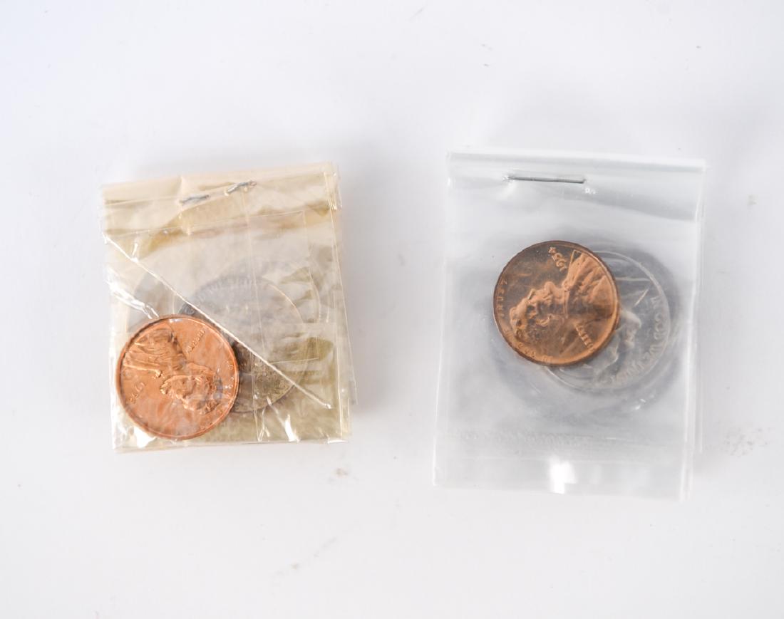 1952 & 1954 US PROOFCOIN SETS: In the original box, tissue, and sealed cellophane wrap. Dimensions: (Box) H .75" x W 2.75" x D 2.75" Condition: All original. 1954 with some color toning.
