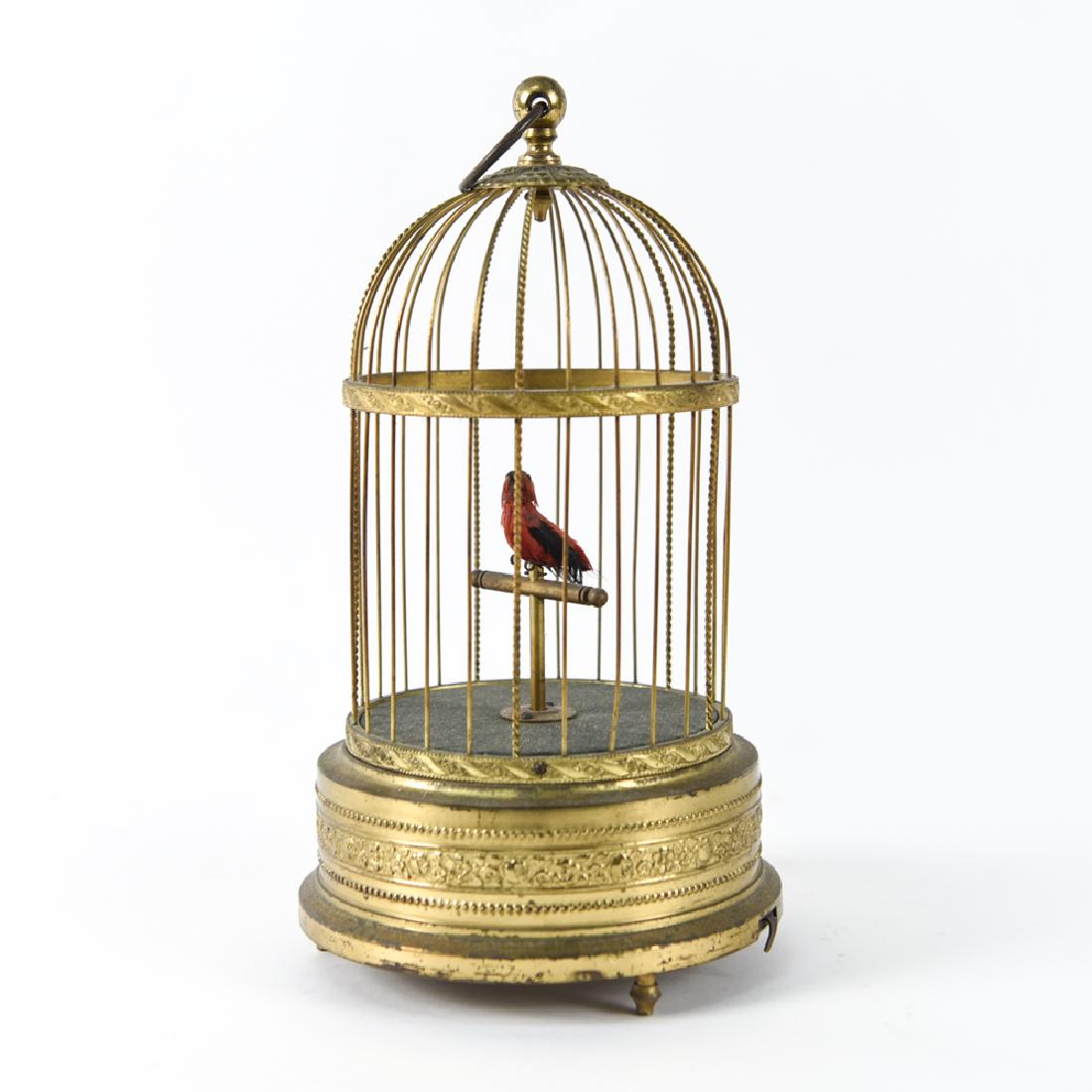 ANTIQUE BIRD CAGE AUTOMATON MUSIC BOX: Dimensions: H 12" x Dia. 6.25" Condition: Not tested. Tarnish. Showing wear consistent with age.