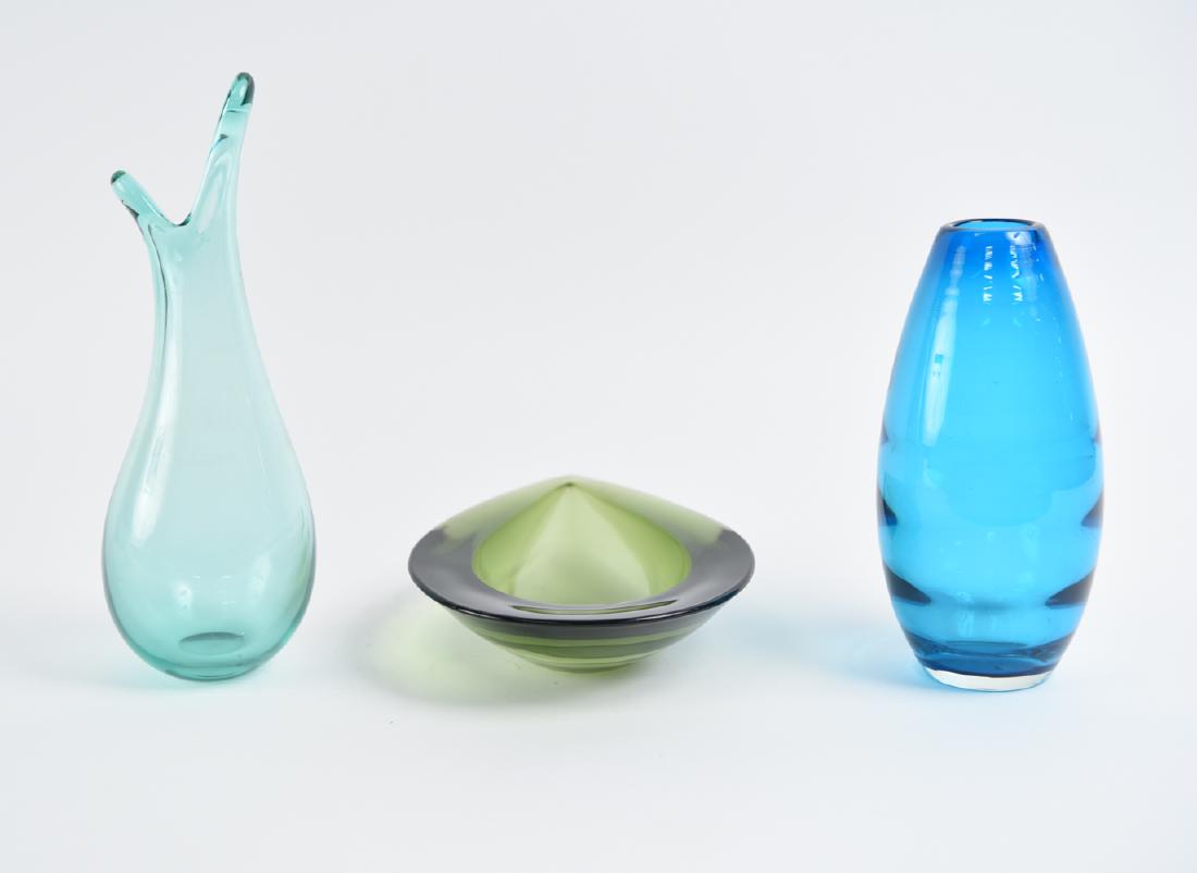 GROUPING OF ART GLASS BY HOLMEGAARD: (3) pieces. All unsigned. Dimensions: (Tallest) H 11.5" x Dia. 4" Condition: Light surface scratches to underside surface.