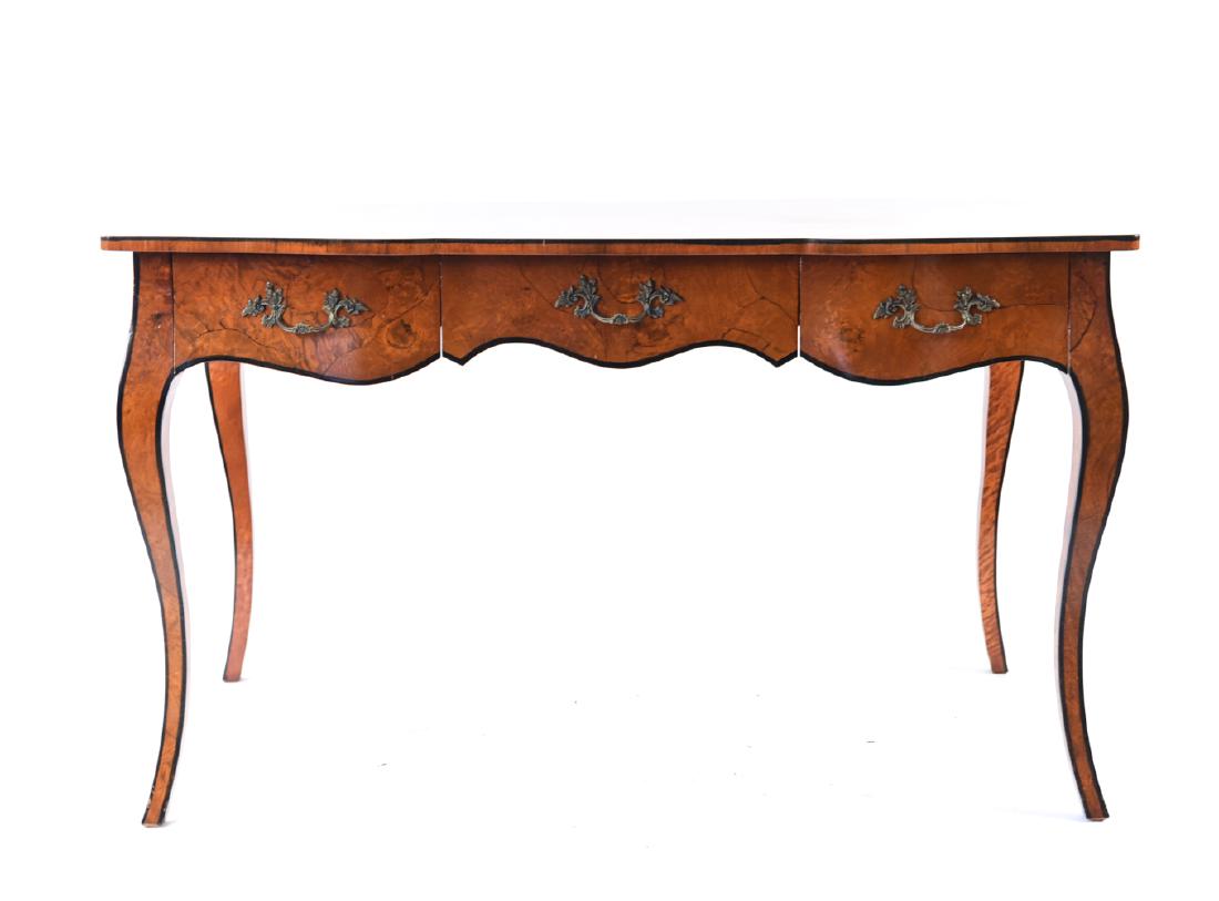 FRENCH BURL FINISH THREE DRAWER DESK: Dimensions: H 30" x W 50" x D 27.5" Condition: Veneer peeling, water damage, some staining. Scratches and scuffs. Some separations to veneer.