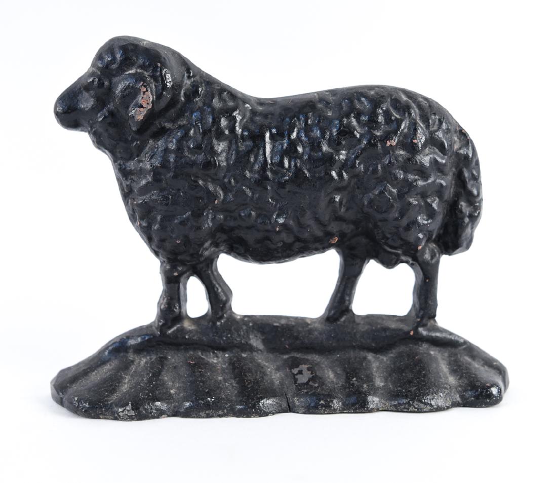 BLACK SHEEP IRON DOORSTOP: contemporary Dimensions: H 7" x W 9.25" x D 1.75" Condition: Some patina and paint loss.