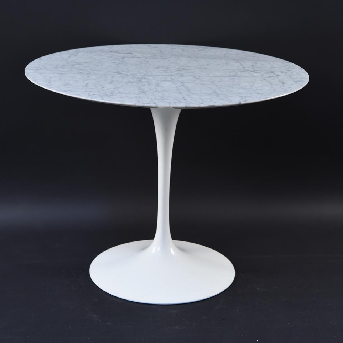 EERO SAARINEN FOR KNOLL STUDIOS TULIP TABLE: Dimensions: H 28" x Dia. 35" Condition: Few nicks to edges of marble top. One repair to edge of marble. Scuffs and light wear to base.