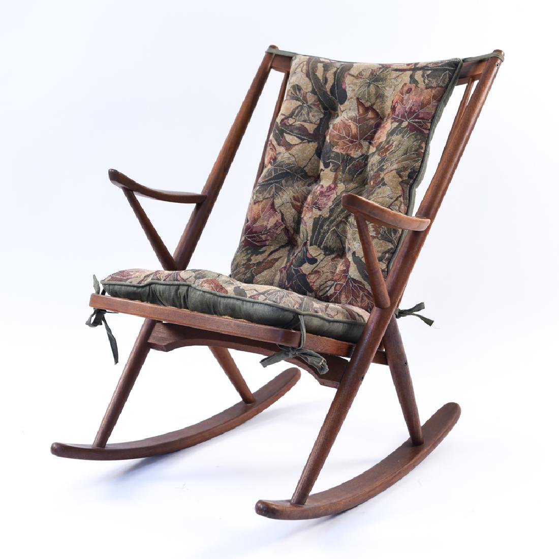 FRANK REENSKAUG; JESPER INTERNATIONAL TEAK CHAIR: Rocking chair. Maker's label underneath. Dimensions: H 34.75" x W 25.75" x D 30.75" x SH 17" Condition: Few minor nicks and scuffs to wood, light wear consistent with age and use.