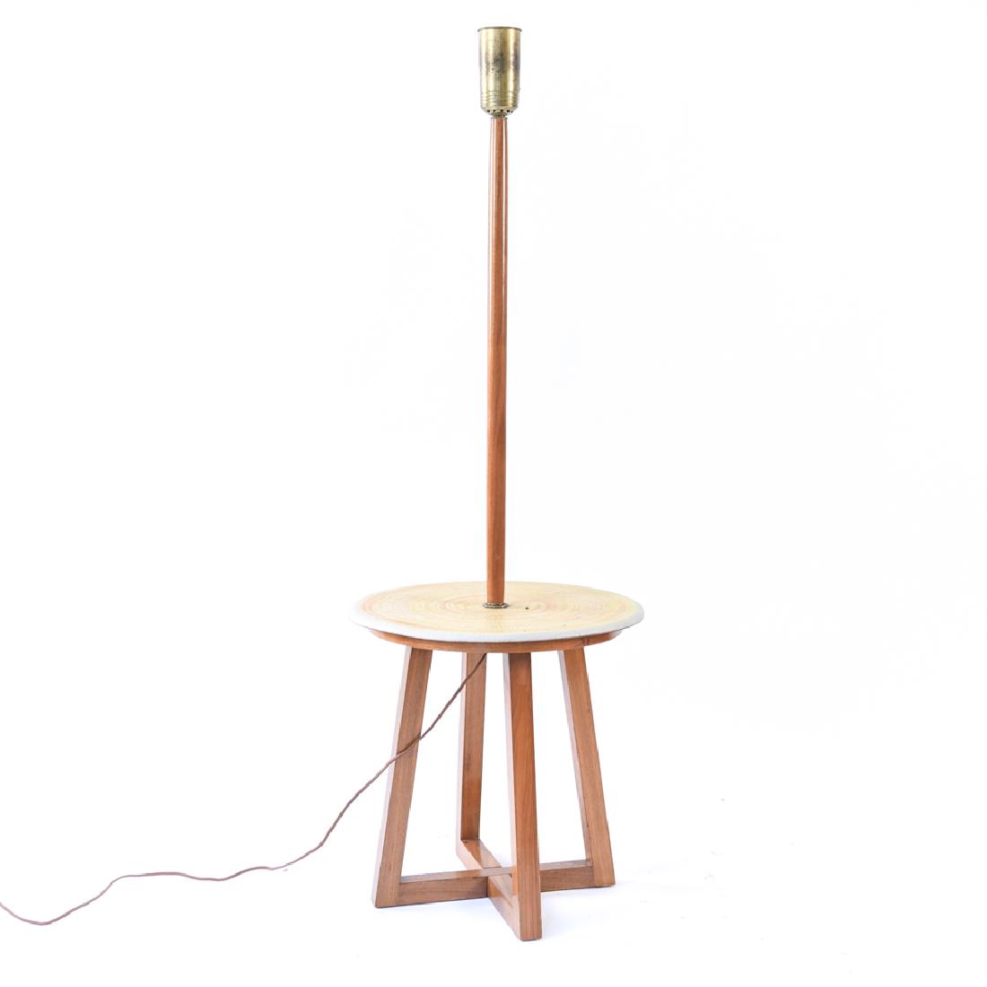 DESIGN TECHNICS MID-CENTURY CERAMIC TOP LAMP TABLE: c. 1950s. Dimensions: H 53.5" x Dia: 18" Condition: Light signs of age and use.