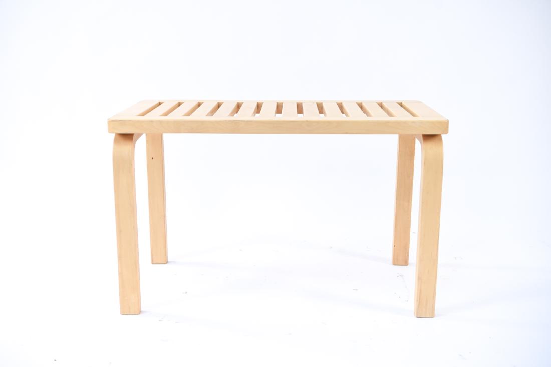 ALVAR AALTO FOR ICF SMALL SLAT BENCH: With ICF, Finland sticker under. Dimensions: H 17.5" x W 28.5" x D 15.75" Condition: Scuffs along edges.