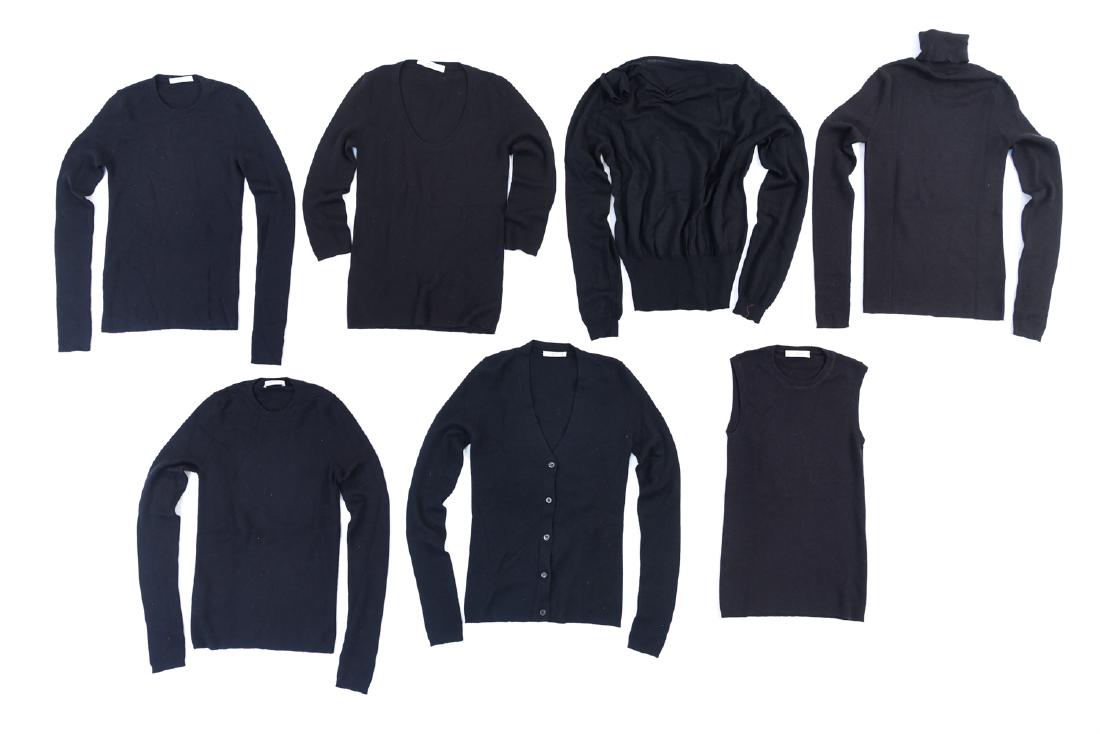 GROUPING OF BLACK PRADA SWEATERS: 7 sweaters and tops, all black. Size: 38 Condition: Unworn or worn once, no tags. Wearable.