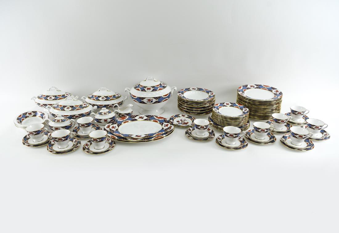 SPODE FINE BONE CHINA PORCELAIN SERVICE: With Shima Border. Marked on bottom(s). 20 dinner plates, 13 soup bowls, 4 lunch plates, 13 cake plates, 11 teacups and saucers, 3 lidded serving dishes, 2 open serving dishes, 1 tureen (No ladle), 2 