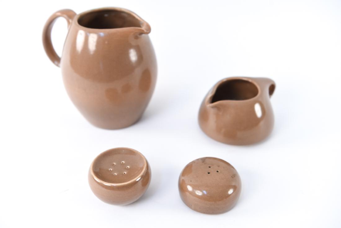 RUSSEL WRIGHT IROQUOIS GROUPING: Including pitcher, salt and pepper and creamer. Dimensions: (Largest) H 6" x W 6" Condition: Showing signs of use, no chips or damage.