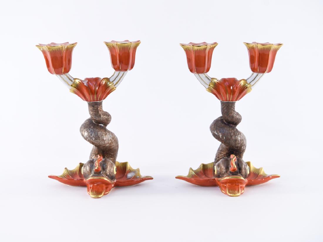 PAIR OF HEREND DOLPHIN CANDLE HOLDERS CANDLESTICKS: Marked "Herend Hvngary hand painted Porcelain" Dimensions: H 7.25" x W 5.5" x D 3.25" Condition: Multiple repairs on one, pieces missing. Provenance: From a Greenwich, CT estate.