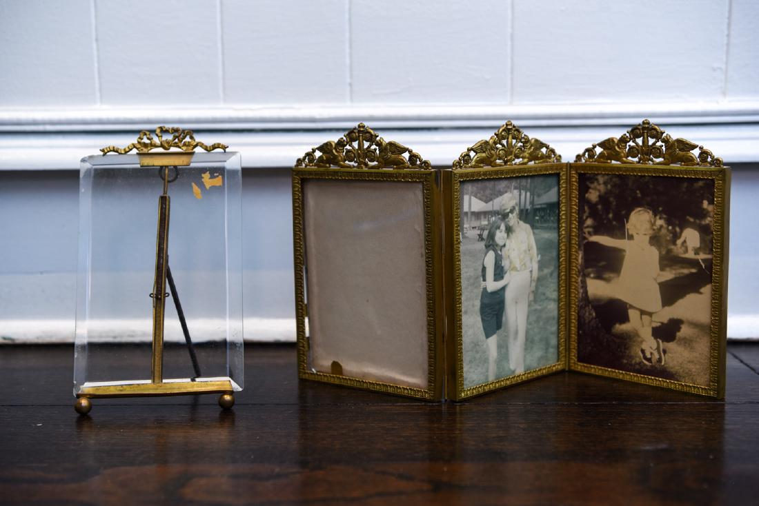 GROUPING OF FRENCH EMPIRE ORMOLU FRAMES: Dimensions: (Bi-fold) H 7.25" x W 13.5" Condition: Slight bends to single frame.