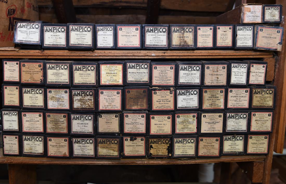 LARGE GROUPING OF AMPICO PLAYER PIANO ROLLS: Dimensions: (Box) H 2.75" x W 12.5" x D 2.75" Condition: Not tested. As shown.
