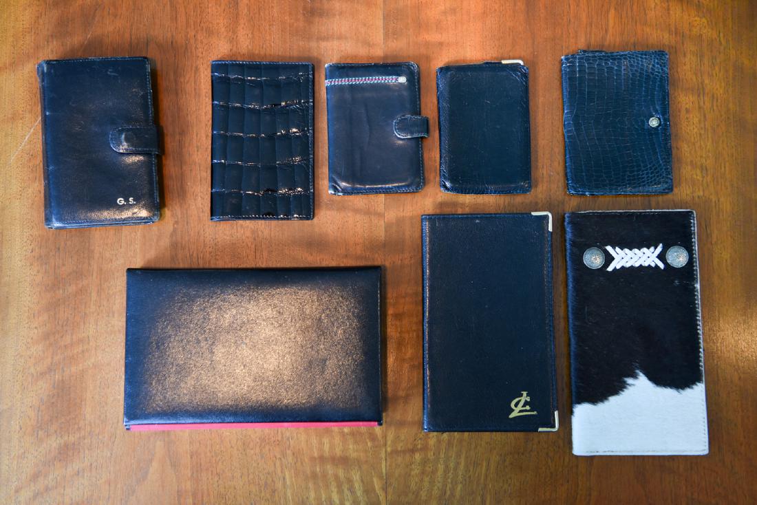 GROUPING OF LEATHER WALLETS, FOLIOS, PICTURE, ETC.: Including folding picture frame, Mark Cross England, Liane Cuir French. Dimensions: (Picture frame, folded closed) H 7.25" x W 4.5" x D 1" Condition: Showing light vintage wear consistent with age and