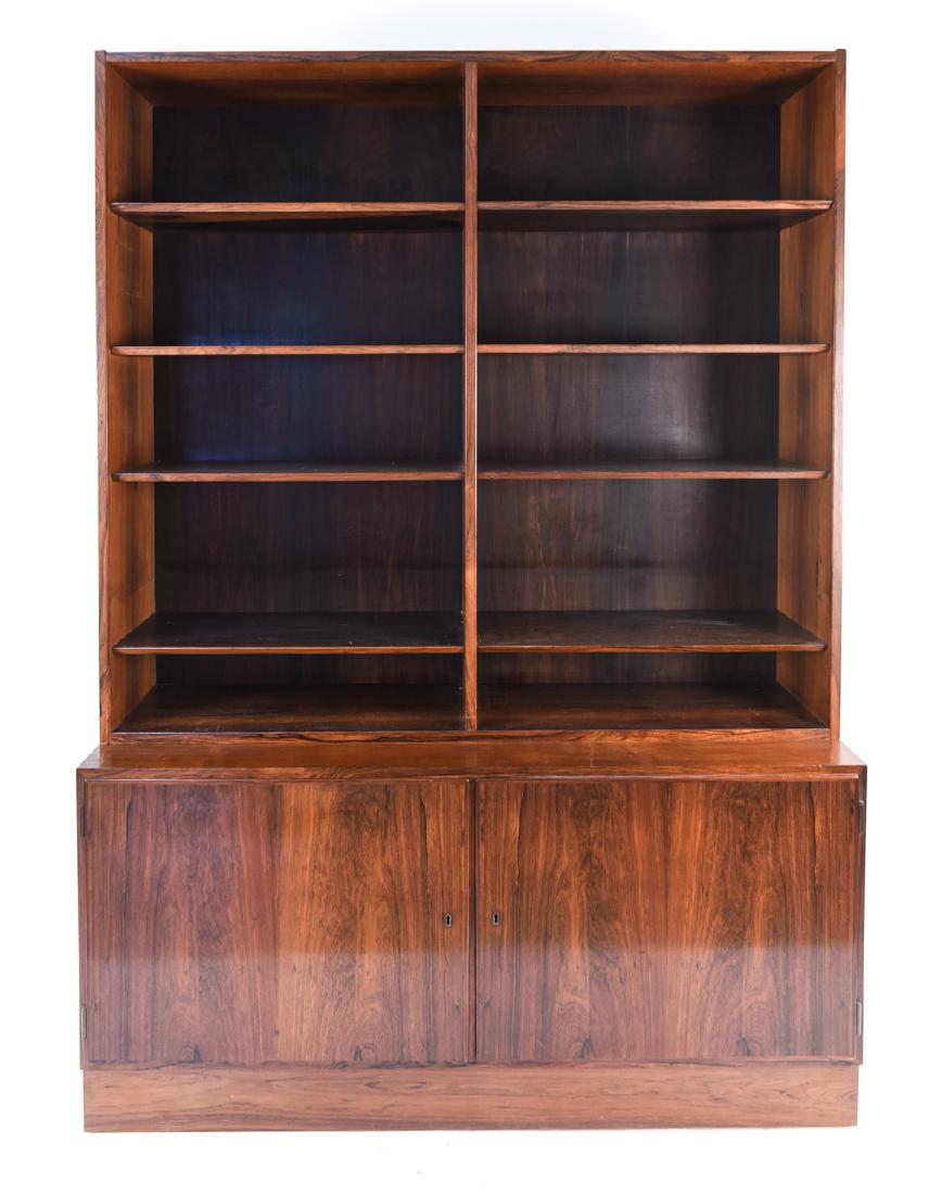 MID-CENTURY DANISH ROSEWOOD WALL UNIT: By Omann Jun. Dimensions: H 76.75" x W 54.5" x D 17" Condition: Wear consistent with age and use. Minor fading. E065