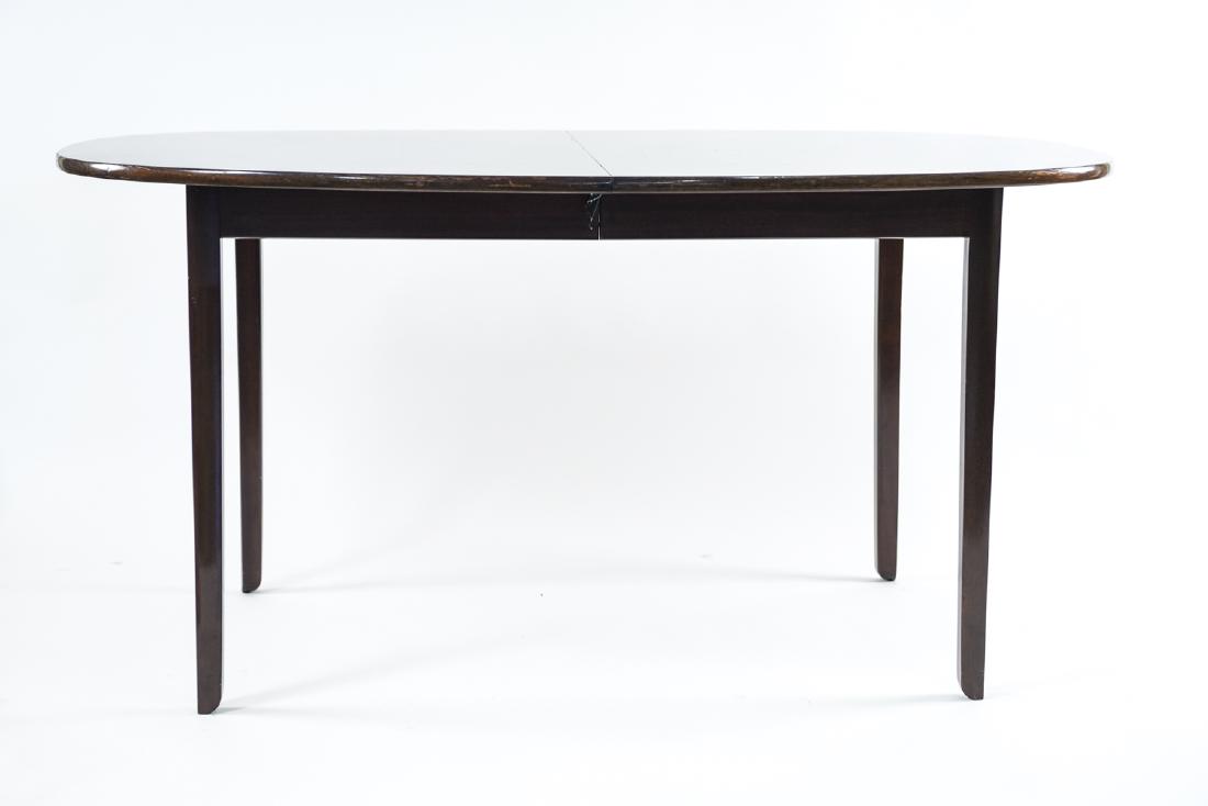 POUL JEPPESEN DANISH MID-CENTURY DINING TABLE: Includes (2) 25.5" leaves. Maker's mark underneath: PJ for Ole Wanscher. Rungsdtedlund design of Wanscher Dimensions: (Without leaves) H 29" x W 57" x D 41" Condition: Scratches, scuffs, some small ch