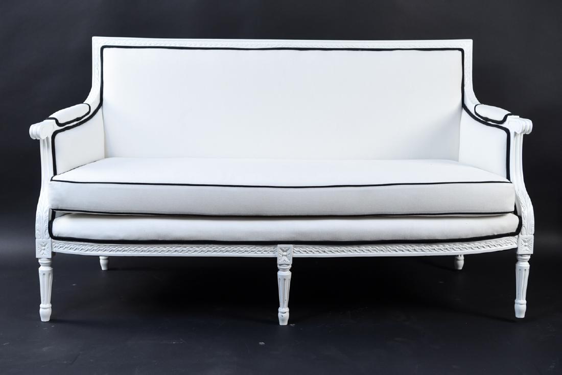 PIPED UPHOLSTRY FRENCH STYLE SETTEE: Dimensions: H 35" x W 62" x D 32" x SH 18" Condition: Freshly upholstered and painted.