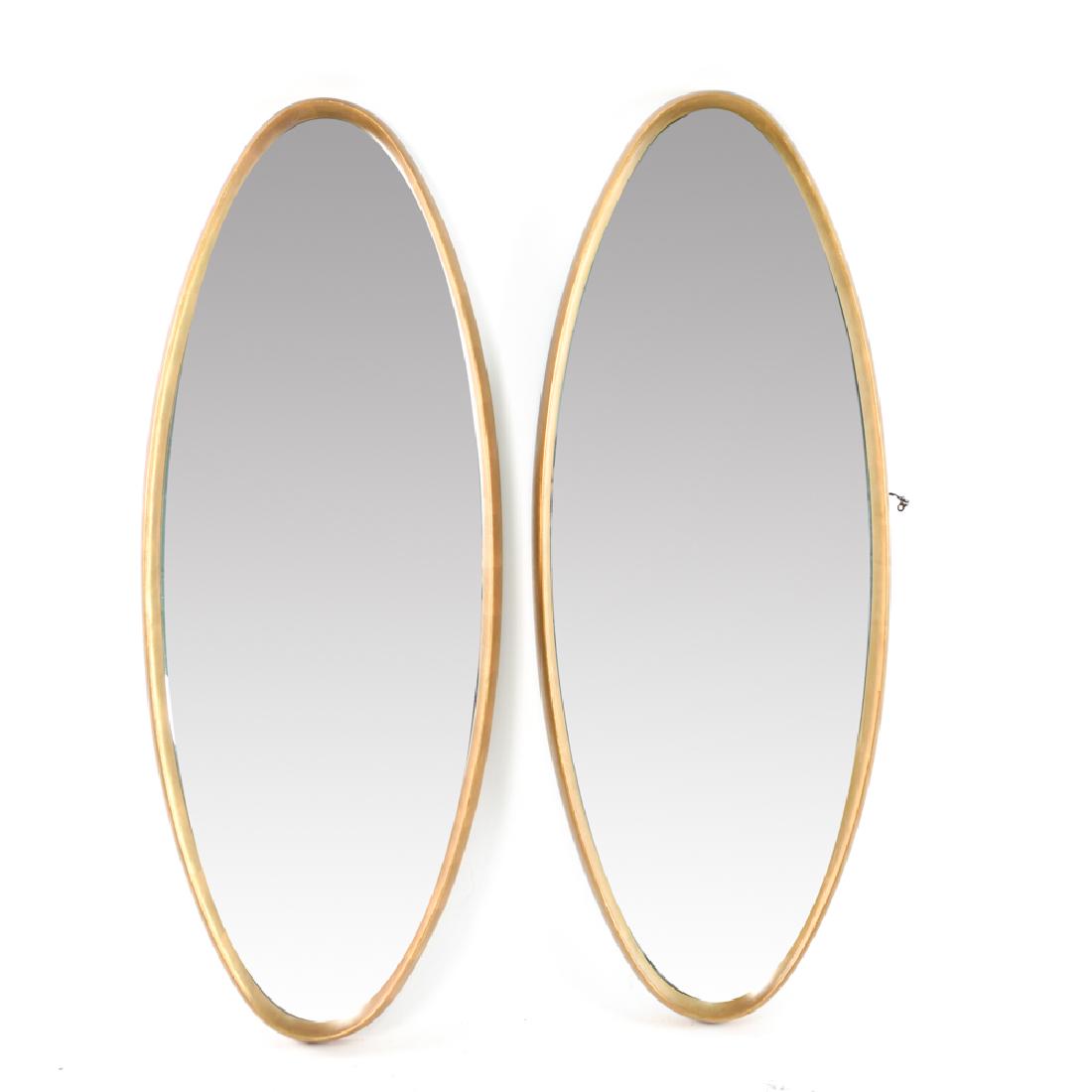 PAIR LA-BARGE MID-CENTURY GILT OVAL MIRRORS: Faux gilt frames. Dimensions: H 47.75" x W 17.25" Condition: Missing few screws to both backings, one with screw missing for wire on back.