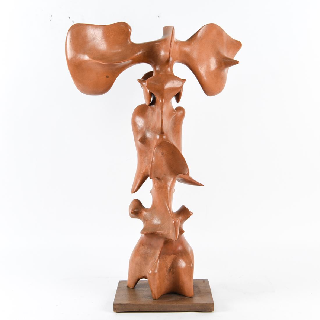 VICTOR ROMAN, ROMANIAN (1937 - 1995) SCULPTURE: Terracotta and wood. Signed. Dimensions: H 32.25" x W 22.25" x D 9" Condition: Old repair halfway down lower portion. Finish wear and marks to wooden base. Some paint wear.
