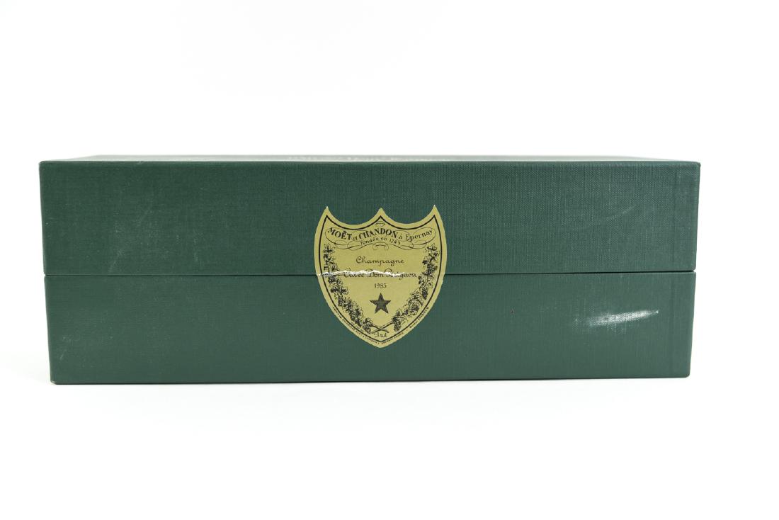 DOM PERIGNON BOXED 1985: Dimensions: H 12.5" x W 4.25" x D 4.25" Condition: In sealed box. Box showing some handling wear.