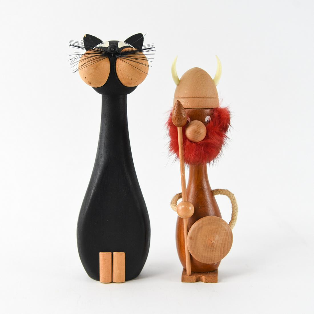 CAT AND VIKING WOODEN GROUPING: Cat and viking. Dimensions: (Cat) 9.25" x W 2.75" x D 2.25" Condition: Some paint wear.