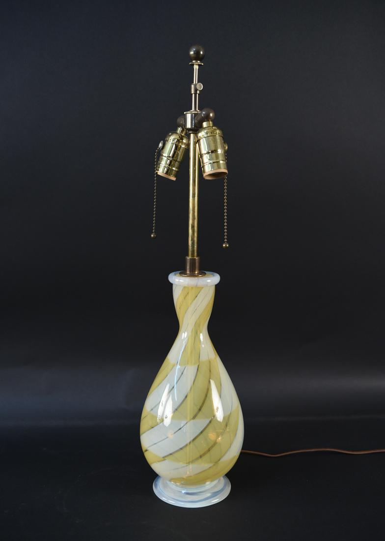 BAROVIER YELLOW PATTERNED GLASS TABLE LAMP: Dimensions: H (to finial) 24.75" x Dia. 6" Condition: Internal crack to glass. Some tarnish to hardware.