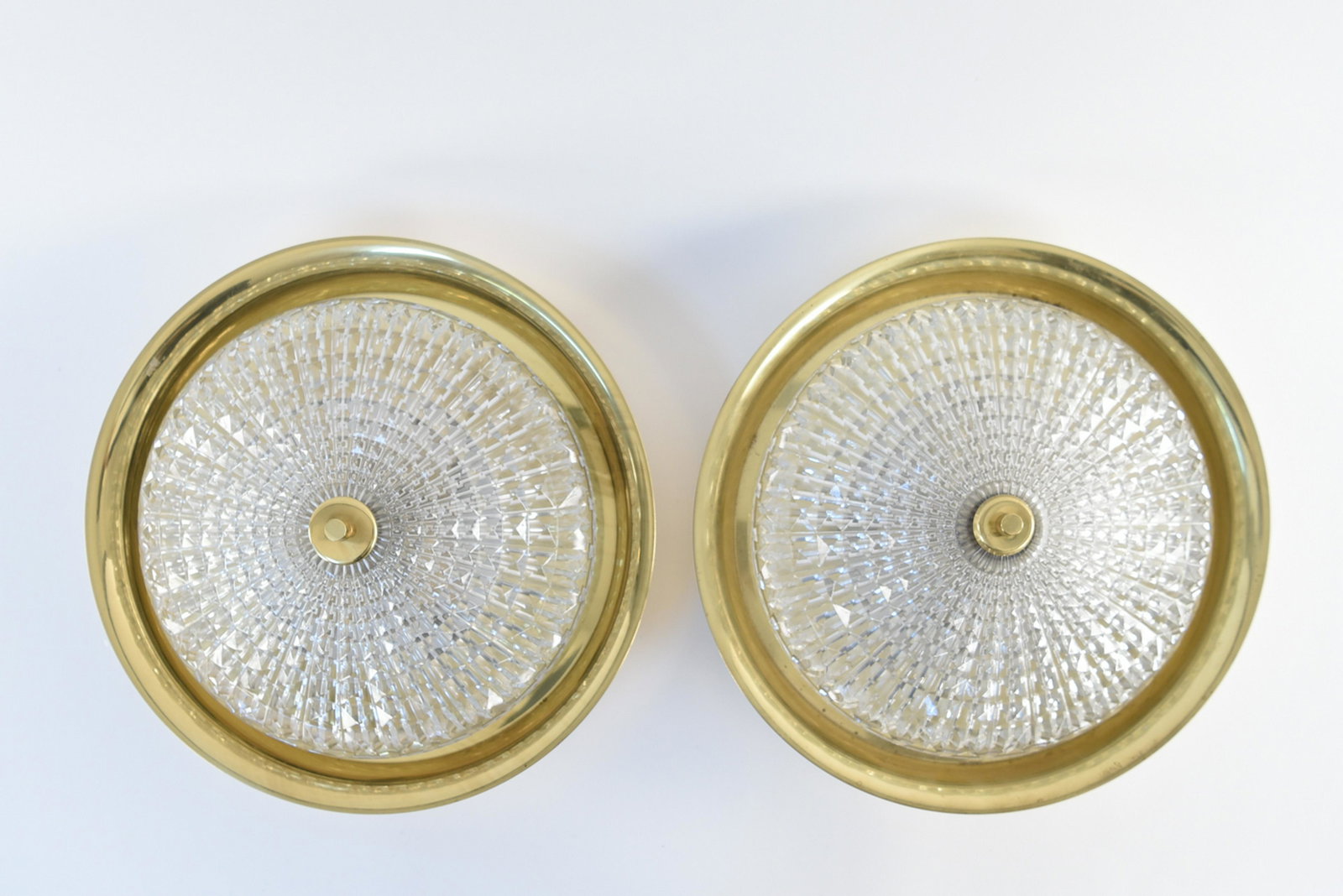 CARL FAGERLUND BRASS & GLASS FLUSH MOUNT LIGHTS: Pair of flush mount lights. Dimensions: H 5" x Dia. 15" Condition: Wear consistent with age and use. E118