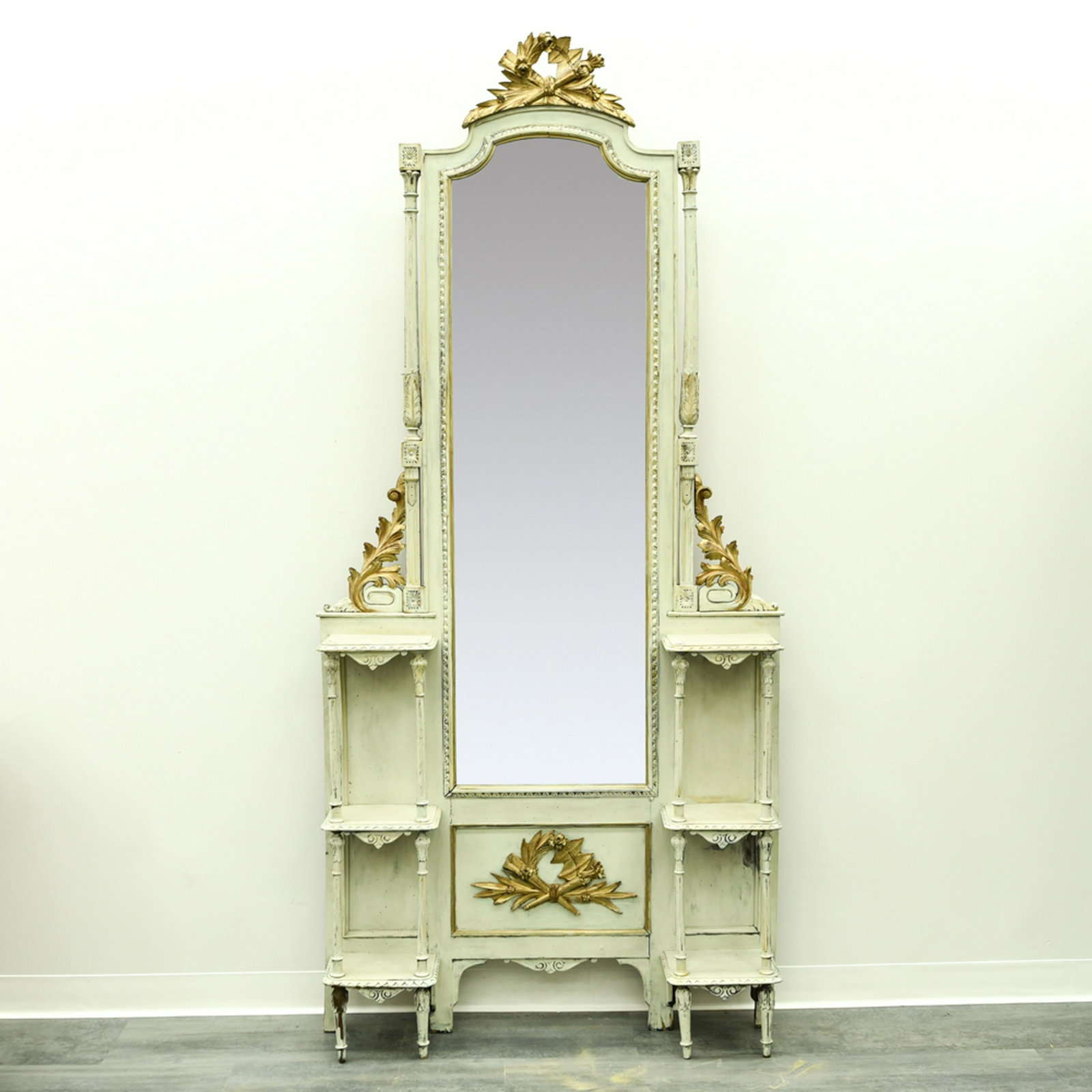 VINTAGE FRENCH HALL MIRROR ETAGERE: Antique with gilt accents. Dimensions: H 91.25" x W 42.25" x D 9.5" Condition: Leans backwards, must be against a wall. Some stress cracks and areas with worming. Rubs and losses to paint finish.
