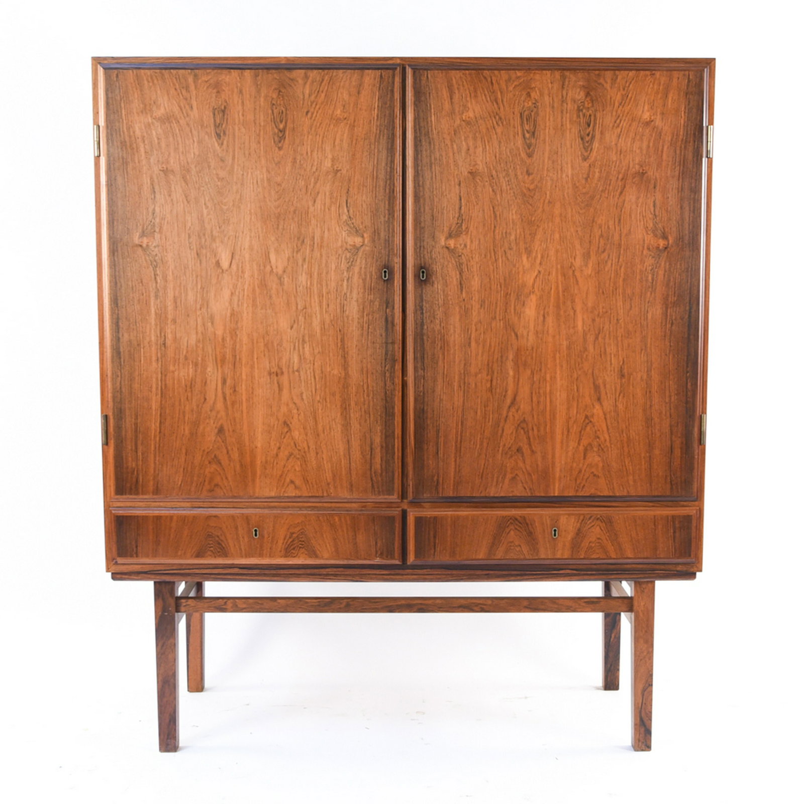 JL MOLLER DANISH ROSEWOOD CUPBOARD CABINET: Danish, mid-century. Dimensions: H 55" x W 47" x D 17" Condition: Wear consistent with age and use. Minor fading. E090