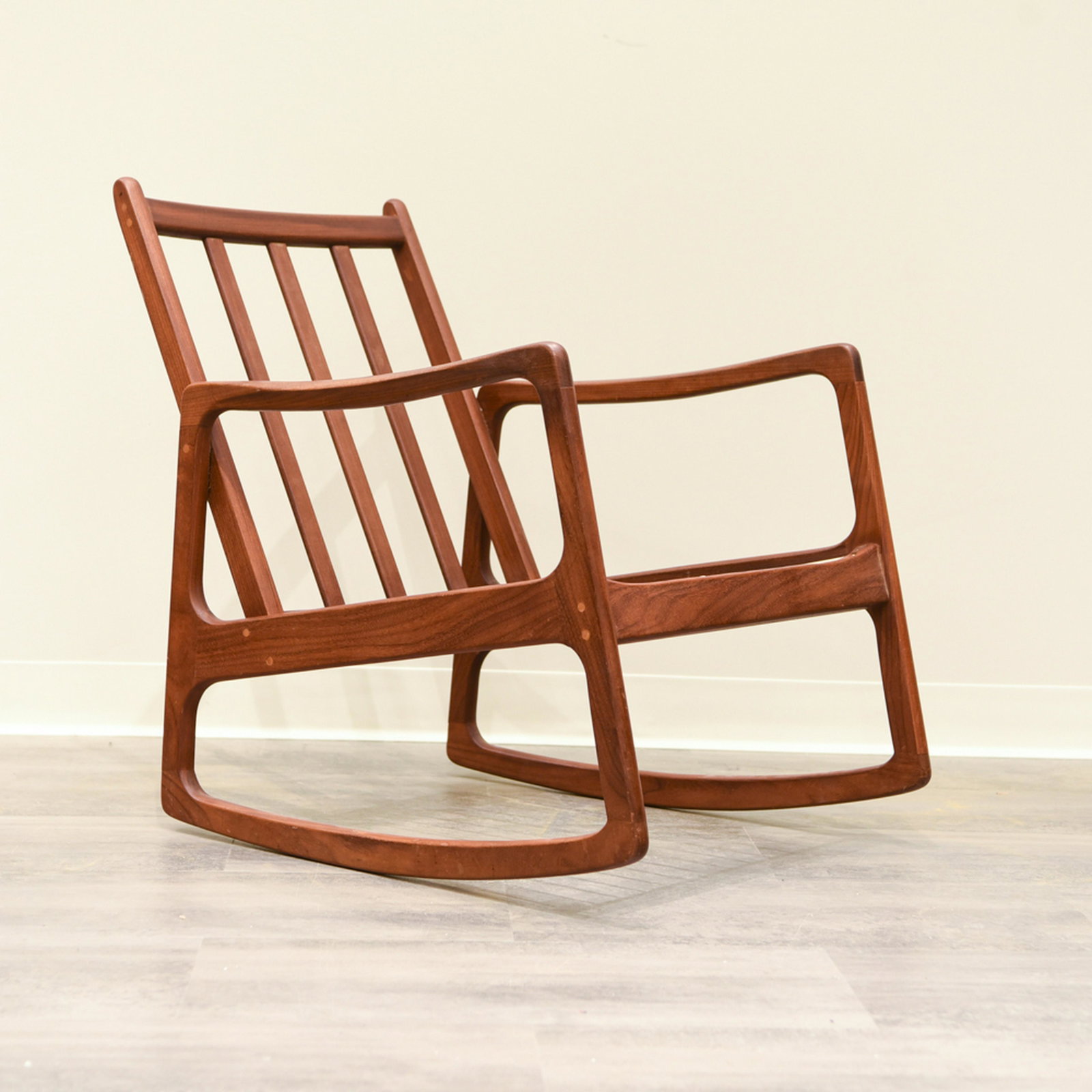 DANISH ROCKING CHAIR BY OLE WANSCHER: Dimensions: H 19" x W 24" x D 29" x SH 13" Condition: Cushions as-is, should be replaced. Few dings and rubs.