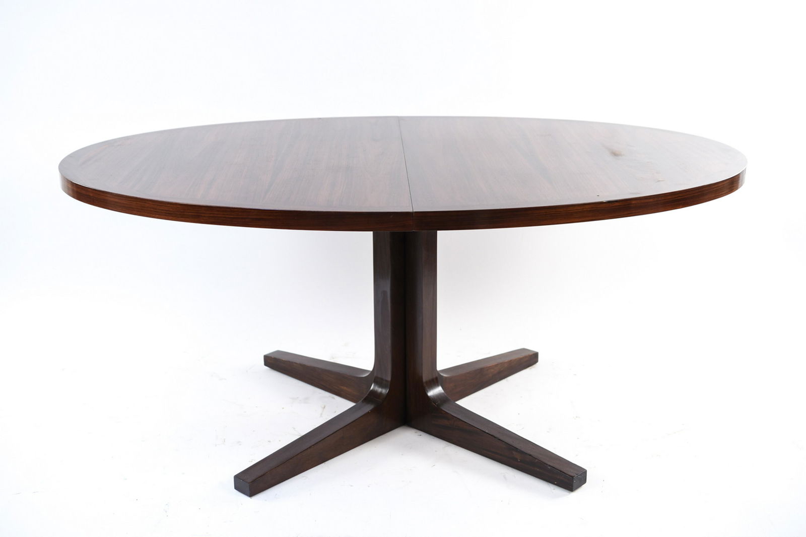 ERIK BUCK BCJ ROSENGAARDEN ROSEWOOD DINING TABLE: With (2) 20" leaves. Marked Rosengaarden underneath. Danish, mid-century, c. 1960s. Erik Buch for Rosengaarden. Dimensions: (Without leaves) H 28" x W 64.5" x D 45" Condition: Some surface scratches a