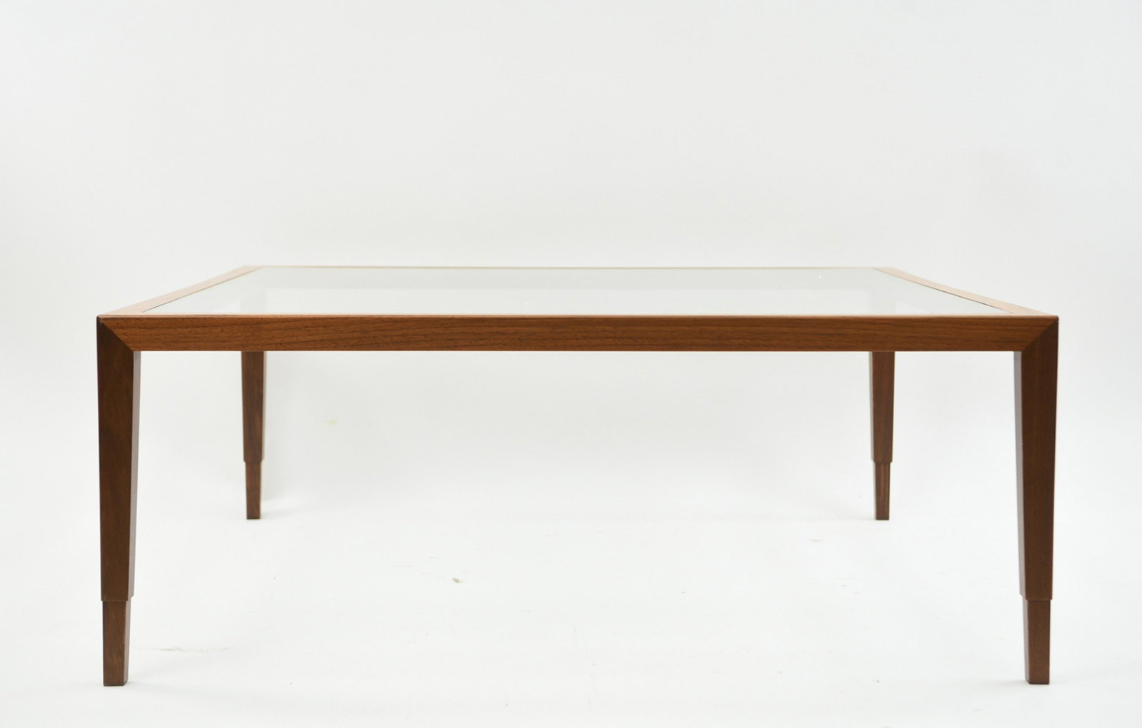 TEAK & GLASS MODERN COFFEE TABLE: Dimensions: H 18.75" x W 47" x D 47" Condition: Few small scuffs and scratches.