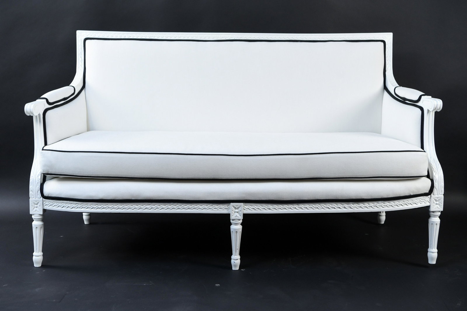 PIPED UPHOLSTERY FRENCH STYLE SETTEE: Dimensions: H 35" x W 62" x D 32" x SH 18" Condition: Freshly upholstered and painted.