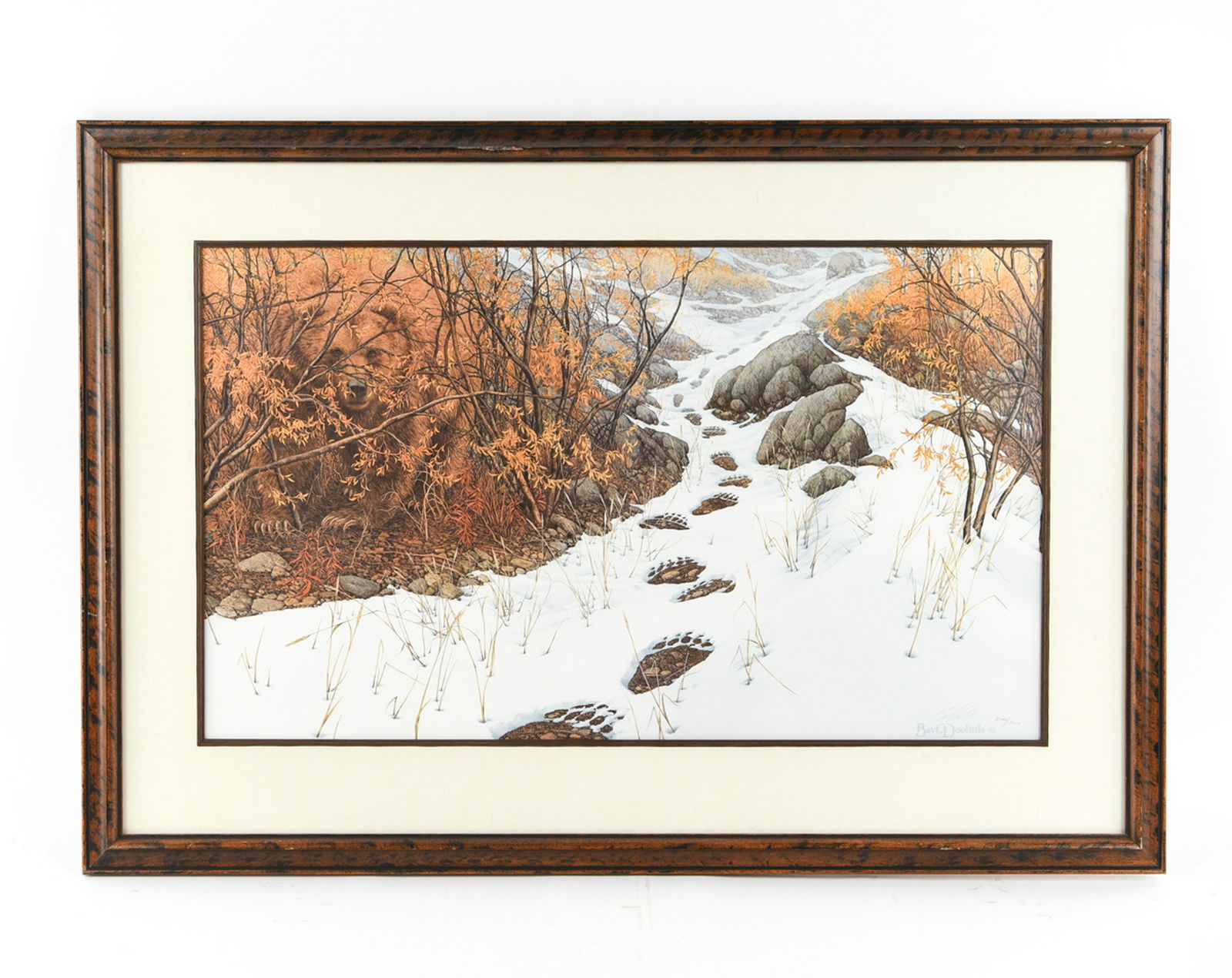 BEV DOOLITTLE PRINT: Signed and editioned lower right. Bev Doolittle, 5040/15000. Titled "Doubled Back". Dimensions: (Frame) H 27.5" x W 39.5", (Sight) H 18.5" x W 30.5" Condition: Some rubs and scuffs to some edges of fr