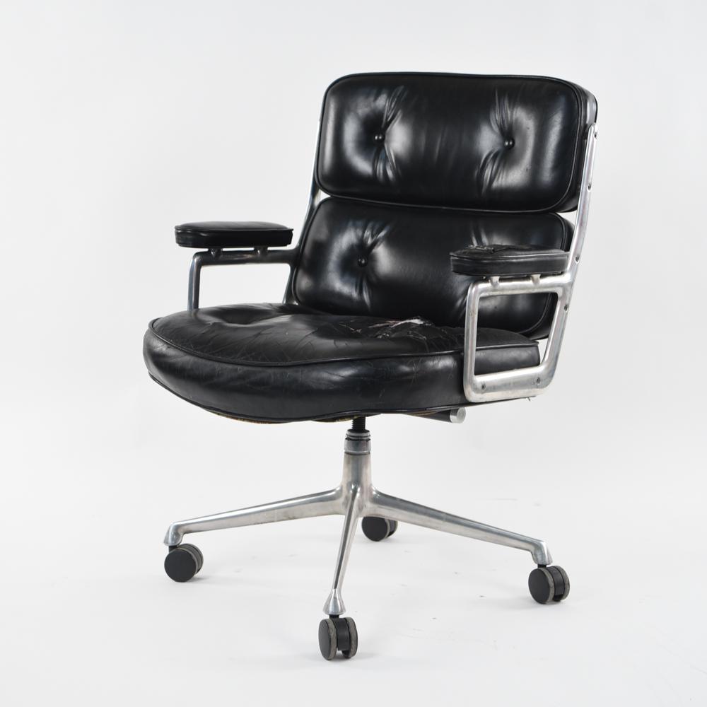 EAMES HERMAN MILLER TIME LIFE EXECUTIVE DESK CHAIR: Tagged underneath: Herman Miller. Dimensions: H 36.25" x W 27" x D 26.5" x SH 18" Condition: Upholstery as is. Large loss and tear to seat. Wear throughout consistent with age and use. Separates from