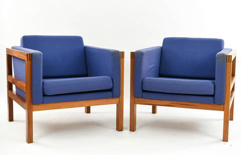 PAIR OF CHRISTIAN HVIDT MAHOGANY LOUNGE CHAIRS: Dimensions: H 25.5" x W 30.25" x D 29.5" x SH 17.5" Condition: Some areas with fading to upholstery. Some rubs and dings to wood. Finish wear to wood. Some sun fading to wood. F011