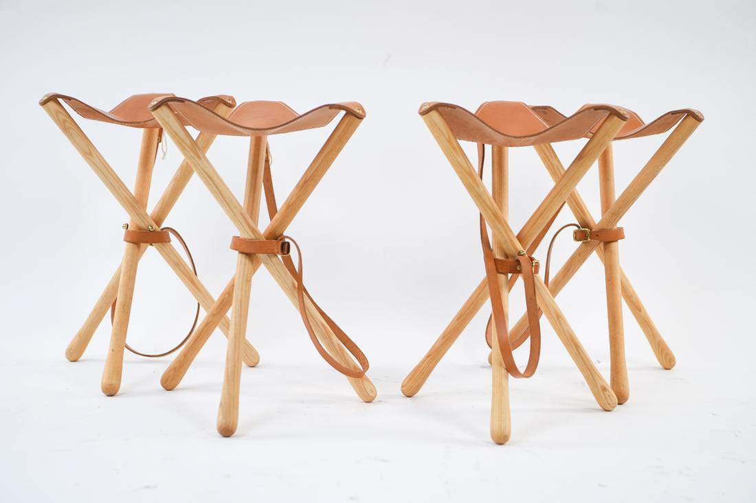 (4) WOOD AND FAULK CAMPSTOOLS: Marked to leather: Wood & Faulk campstool. Dimensions: (Open) H 20" x W 13.5" x D 13" Condition: Very light surface wear.