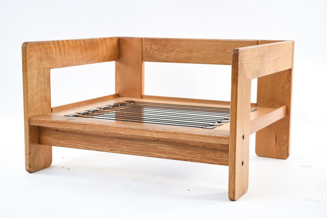 TOBIA SCARPA "BASTIANO" SOLID OAK LOUNGE CHAIR: Lounge chair frame for Knoll, with original receipt. Dimensions: H 21.25" x W 35.75" x D 30" x SH 9" Condition: Light wear consistent with age and use.