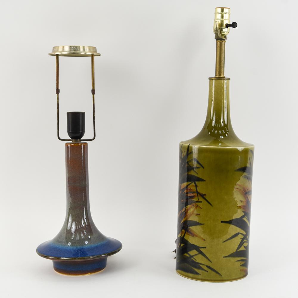 (2) MID CENTURY SCANDINAVIAN MODERN CERAMIC LAMPS: Soholm and Arabia Finland, original wiring. Arabia with maker's sticker, Soholm signed underneath. Dimensions: (Taller, to socket) H 22.5" x Dia. 6.5" Condition: Both tested: in working order (though 