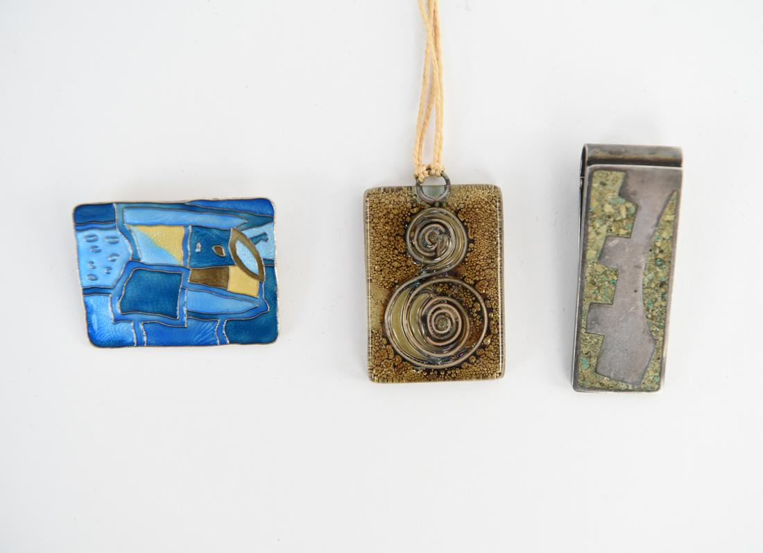 GROUPING OF MODERNIST JEWELRY INCL. STERLING: Including marked enamel and sterling David Andersen, Norway pin, Mexican sterling money clip, and art glass pendant on string. Dimensions: (Pin) H 1.25" x W 1.75" Condition: Light wear consistent with