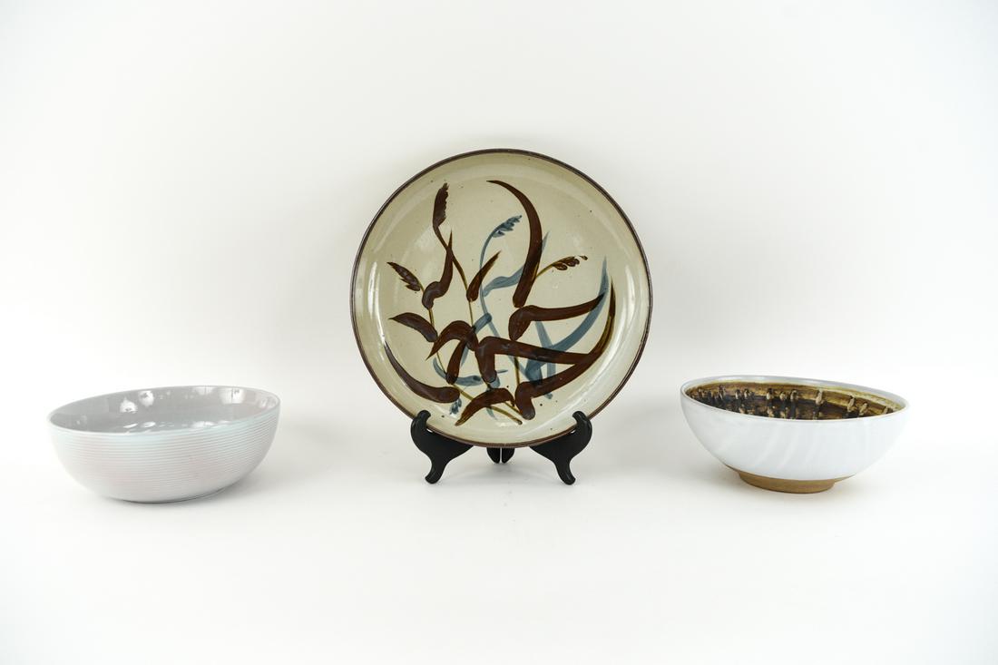 (3) MID-CENTURY CERAMIC SERVING BOWLS: Rare Arabia Finland new old stock gray bowl, Martz Marshall studios bowl, and Dansk platter. Dimensions: (Largest) H 1.25" x D 13.5" Condition: No issues to note.