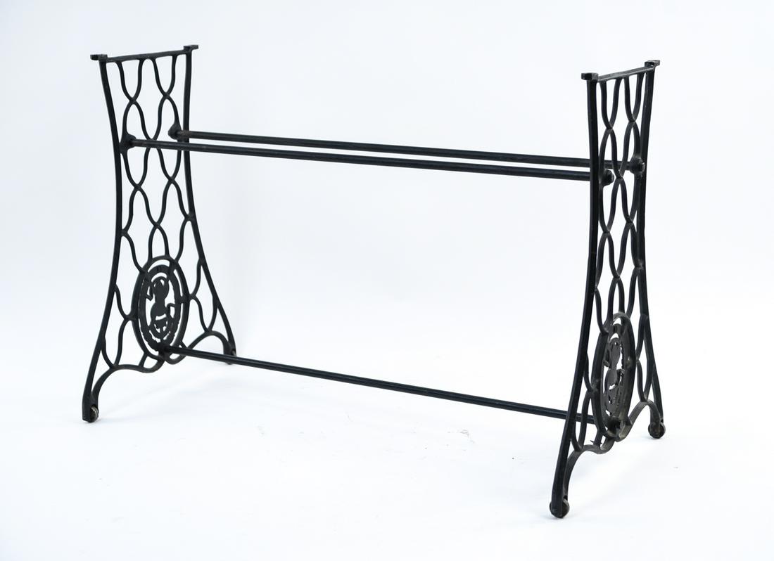 IRON SEWING TABLE BASE: Dimensions: H 28" x W 41" x D 18.75" Condition: Some paint wear and areas of rust. Wear consistent with age and use.