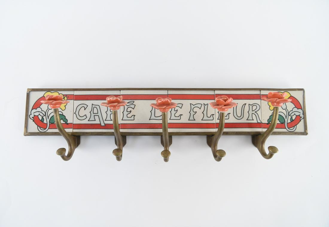 TILE COAT RACK: Dimensions: H 6" x W 23.75" x D 4" Condition: Right side solder/weld joints are cracked, but tiles are firmly in place. Some tarnish.