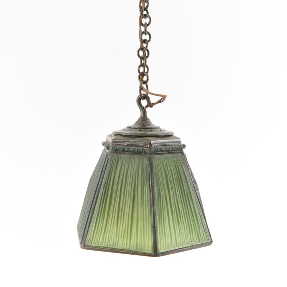 TIFFANY STUDIO LINEN FOLD HANGING FIXTURE: Marked Tiffany Studios on interior rim. Bronze and linen fold textured green glass. Dimensions: Fixture only: H 11" x Dia: 8.5" Condition: showing normal signs of age, small scracthes to inside surfac