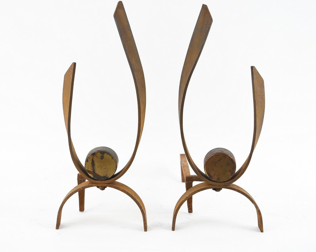 PAIR OF DONALD DESKY ANDIRONS: Dimensions: H 21" x W 8" x D 16.25" Condition: Rust.