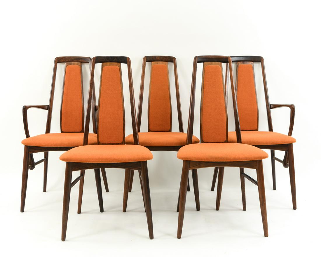 (5) NIELS KOEFOEDS DANISH ROSEWOOD DINING CHAIRS: Two arm chars and 3 side chairs. Marked Made In Denmark under seat.Dimensions: (Armchair) H 38" x W 21" x D 22"Condition: Showing wear consistent with use. Break repair to one armrest. Few light marks