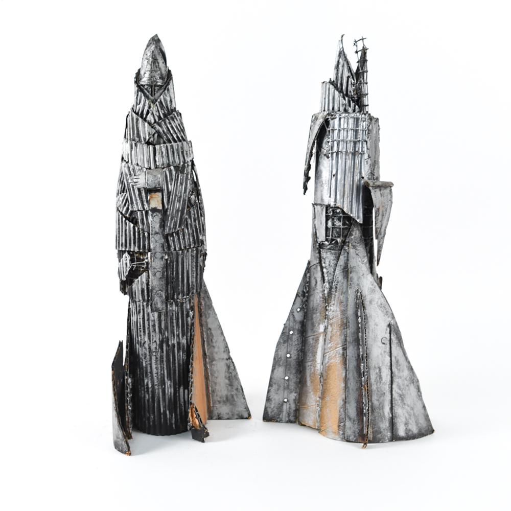 (2) NICK DE ANGELIS (AMERICAN 1921-2004) SCULPTURE: Painted and assembled cardboard. Dimensions: H 18" x W 6.25" x D 7.5" Condition: Some surface wear and loss.